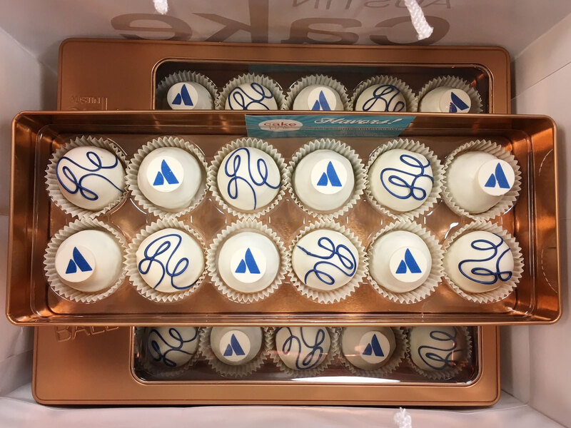 Business logo cake balls with custom drizzles