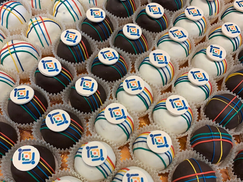 Logo branded cake balls for a company all hands meeting